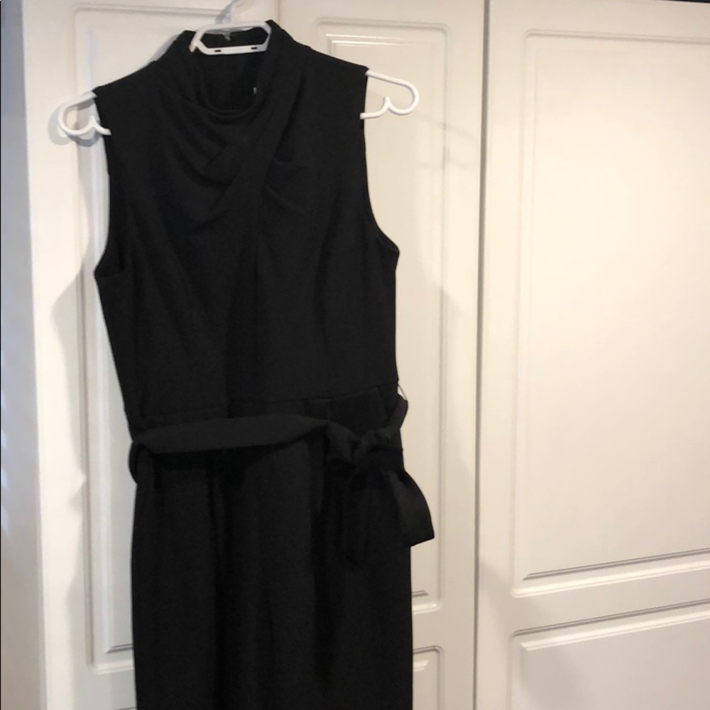 Black jumpsuit with peekaboo neckline